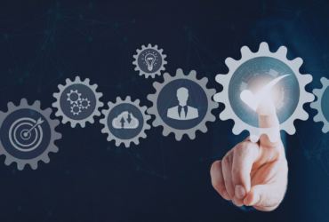 IT professionals managing SAP application services on screens.