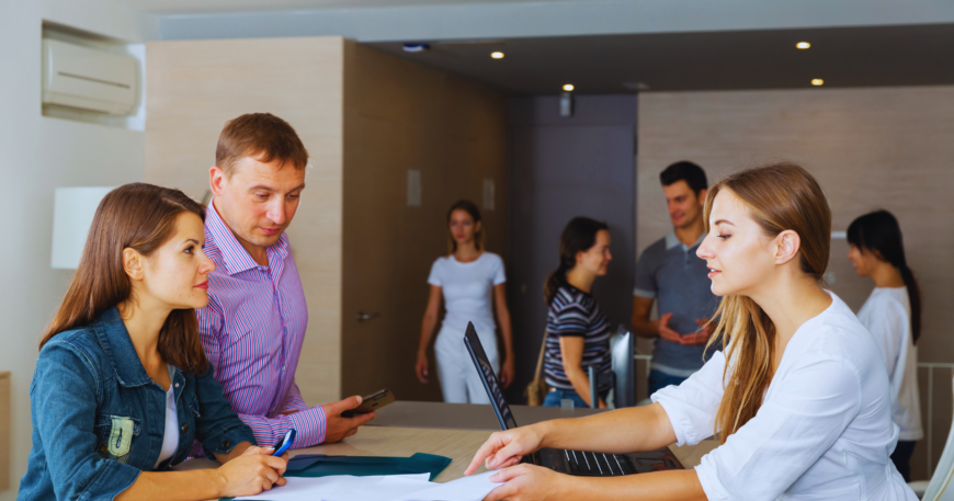 Modern office setting with IT professionals collaborating.